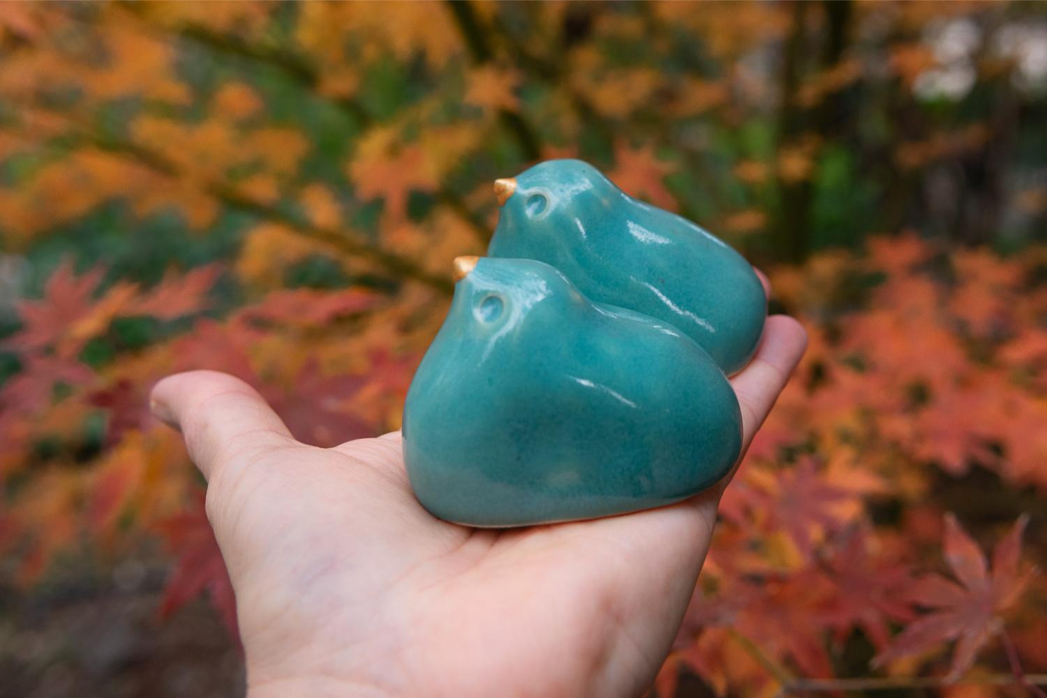 Pair of turquoise birds in a nest - Image 2